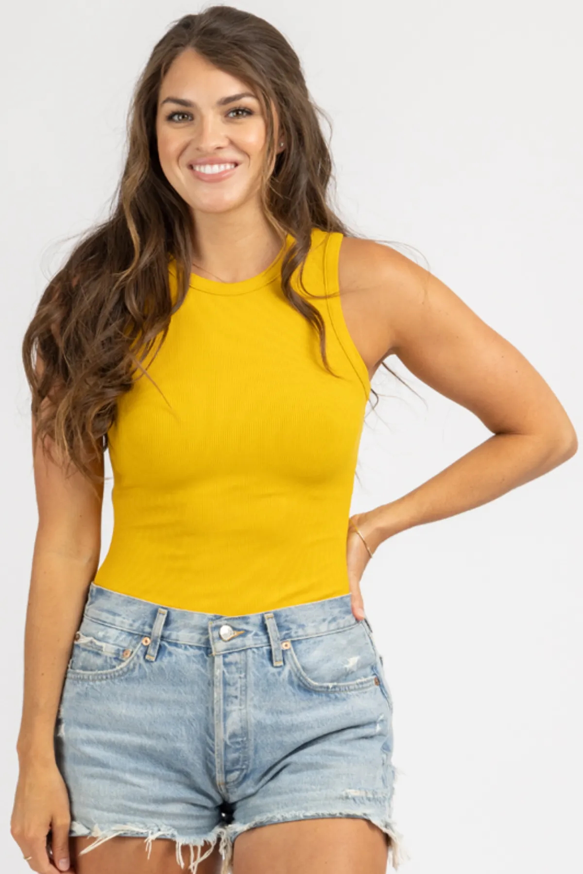 ROUND NECK SLEEVELESS BODYSUIT IN GOLD